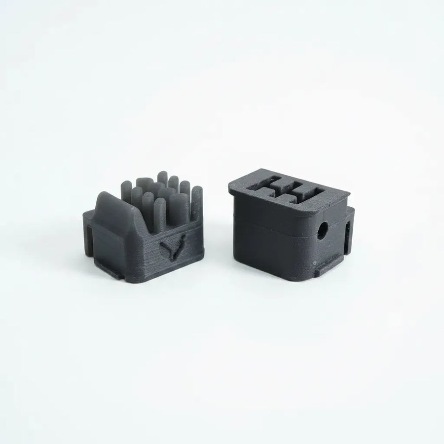 Side-by-side comparison of BenchRebel silicone nozzle wiper upgrade for Bambu Lab P2S and X2D 3D printers.